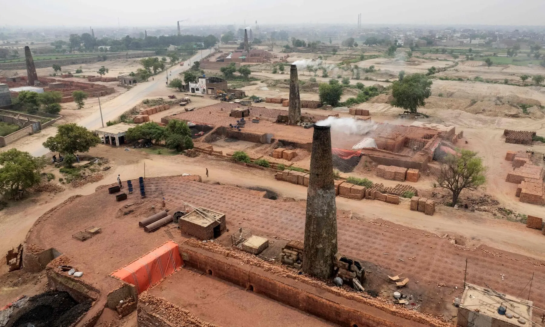 An aerial view shows a brick kiln in Sheikhupura, in Punjab on July 20, 2026. —AFP