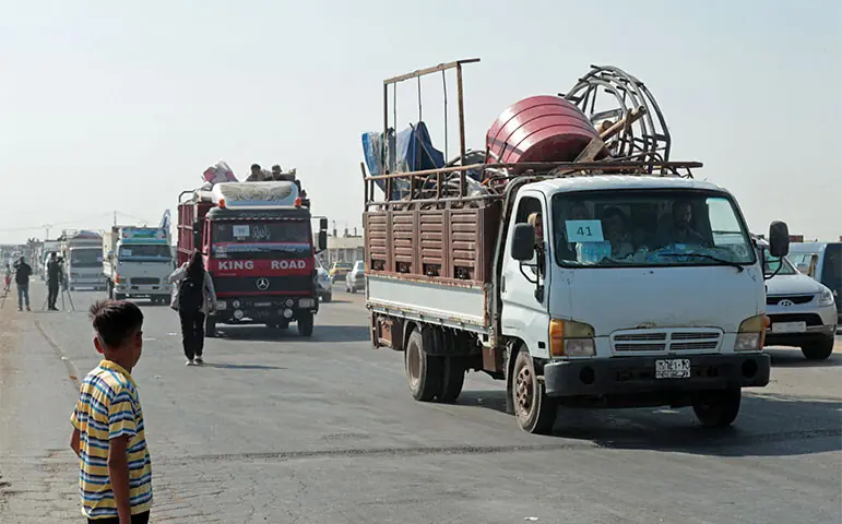 Syrian Kurds head back to the northeastern border town of Ras al-Ain.—AFP Syrian Kurds head back to the northeastern border town of Ras al-Ain.—AFP