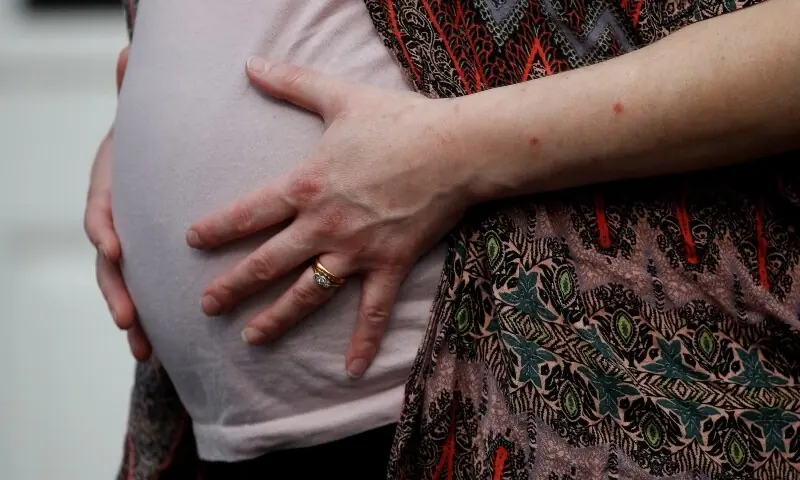 Stephanie Bowers who is eight months pregnant poses for a photograph outside her home in Manchester, Britain April 9, 2020. — Reuters/File Stephanie Bowers who is eight months pregnant poses for a photograph outside her home in Manchester, Britain April 9, 2020. — Reuters/File