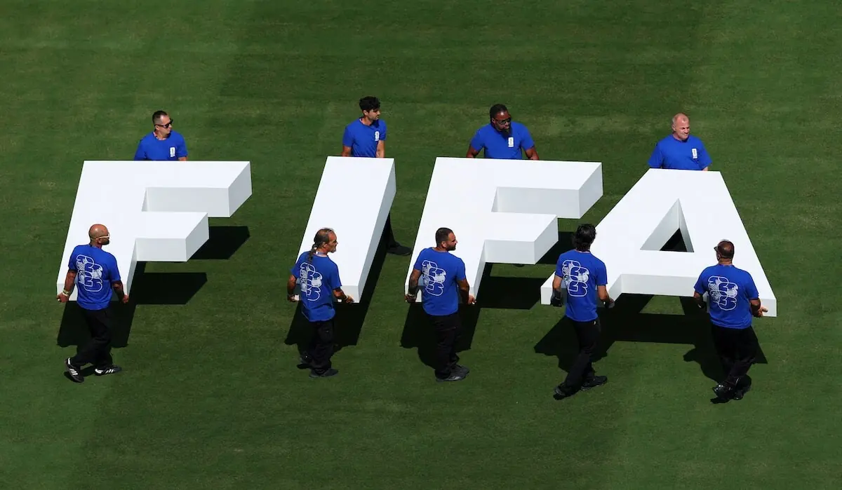 Soccer Football - FIFA World Cup 2026 - Final - Spain v Argentina - New York/New Jersey Stadium, East Rutherford, New Jersey, U.S. - July 19, 2026 Pitch staff carry the FIFA logo on the pitch before the match. —Reuters Soccer Football - FIFA World Cup 2026 - Final - Spain v Argentina - New York/New Jersey Stadium, East Rutherford, New Jersey, U.S. - July 19, 2026 Pitch staff carry the FIFA logo on the pitch before the match. —Reuters