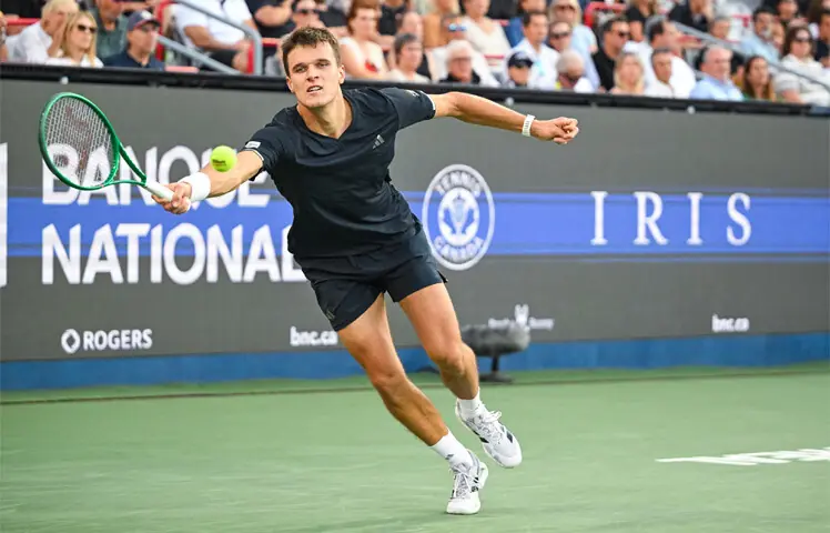 MONTREAL: Czech Republic’s Jakub Mensik returns the ball to Ben Shelton of the US during their Montreal Masters quarter-final at the IGA Stadium.—Reuters MONTREAL: Czech Republic’s Jakub Mensik returns the ball to Ben Shelton of the US during their Montreal Masters quarter-final at the IGA Stadium.—Reuters