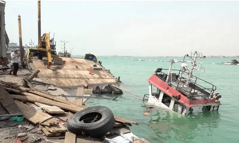 THE wreckage of a boat damaged by Houthi strikes is seen at the harbour, in the Red Sea port city of Mocha.&mdash;Reuters