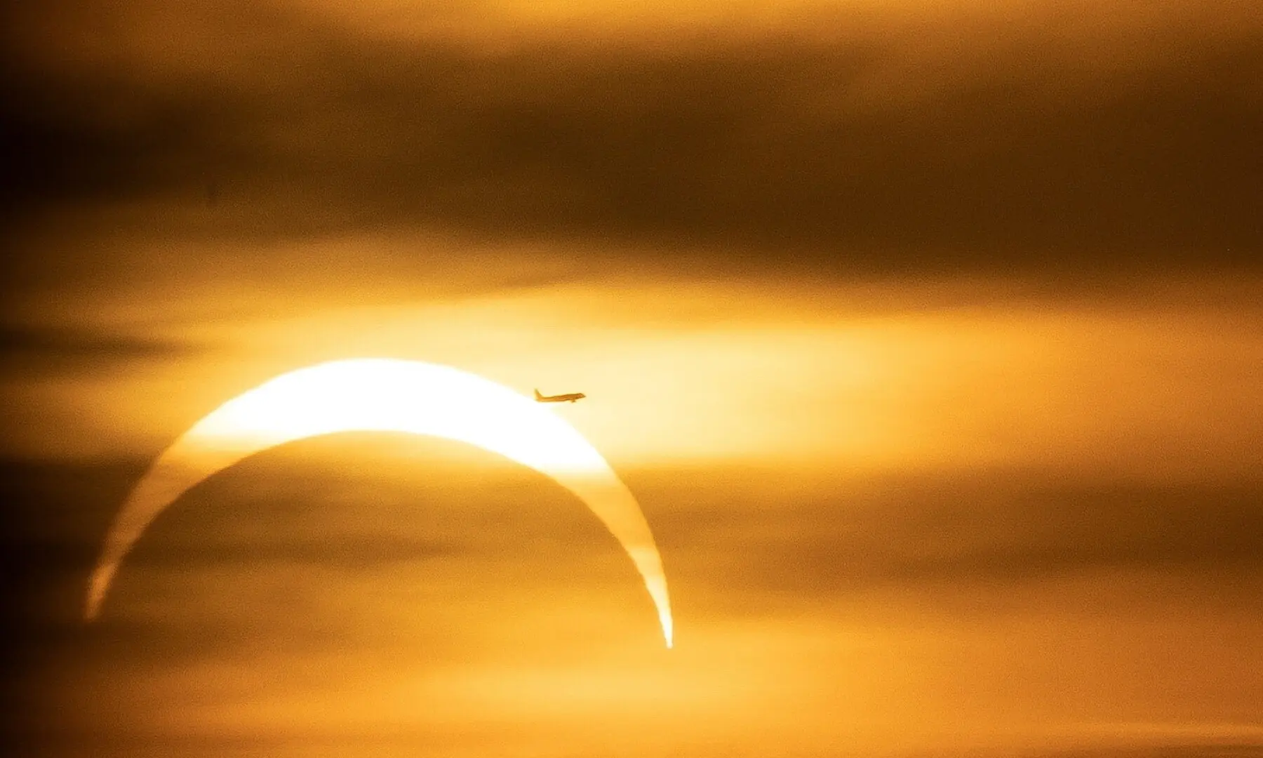  Airplane pass the sun as the moon partially covers during a solar eclipse ,as seen from Prague, Czech Republic, August 12, 2026. —Reuters 