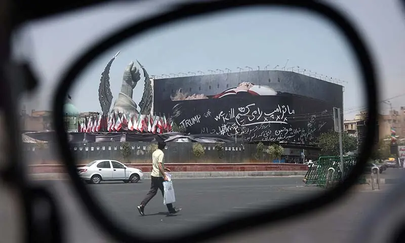 A billboard depicting US President Donald Trump lying in a coffin can be seen in Tehran, Iran on July 30, 2026. — Reuters/File