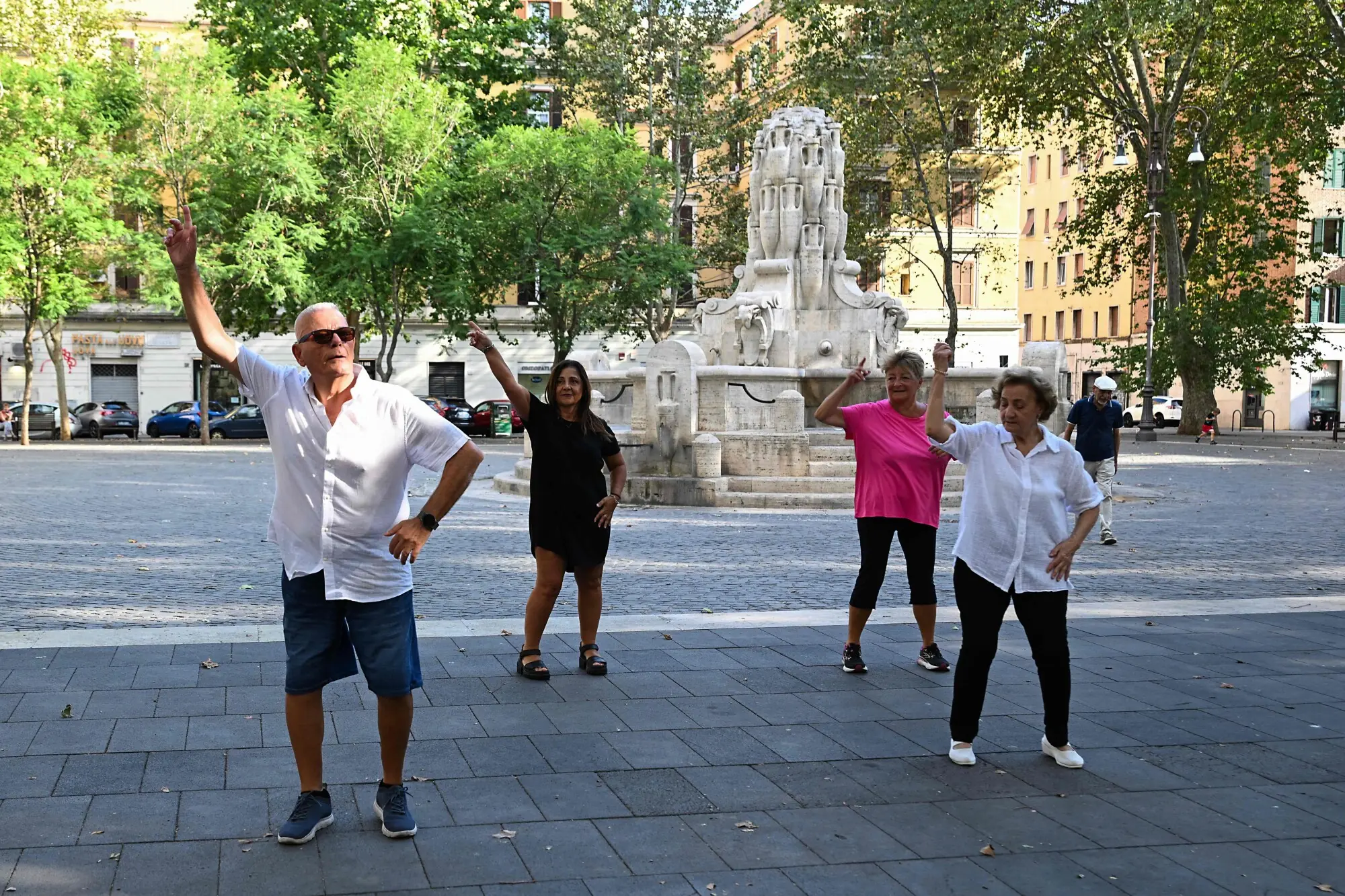 Iannotta and Fava dance with other enthusiasts in Rome. Photo: AFP