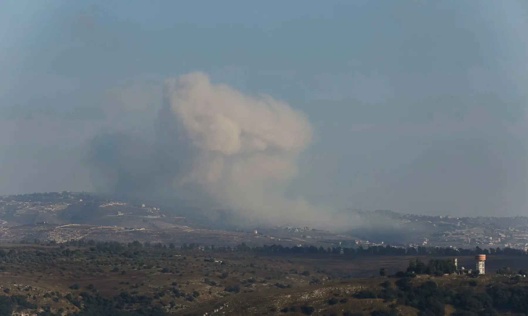 This picture taken from the southern Lebanese village of Zawtar al-Gharbiyah shows smoke billowing from the site of an Israeli controlled explosion in the village of Bani Hayyan on August 13, 2026. &mdash; AFP