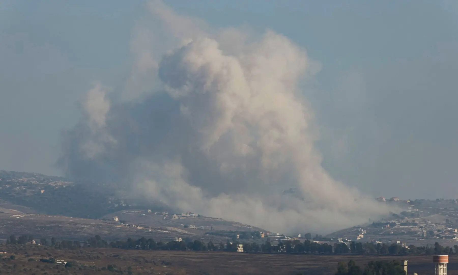 This picture taken from the southern Lebanese village of Zawtar al-Gharbiyah shows smoke billowing from the site of an Israeli controlled explosion in the village of Bani Hayyan on August 13, 2026. &mdash; AFP
