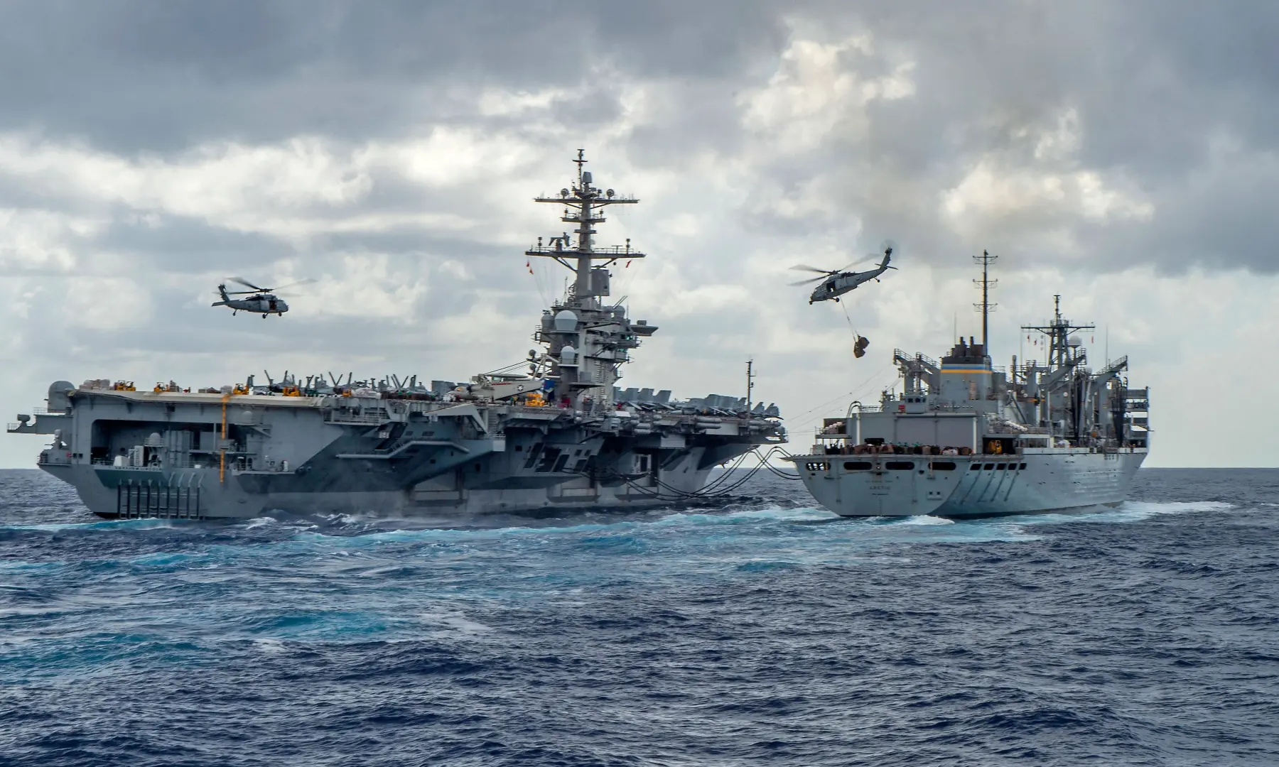 This handout picture released by the US Navy on May 8, 2019 shows the USS Abraham Lincoln aircraft carrier while conducting a replenishment-at-sea. &mdash; AFP/File