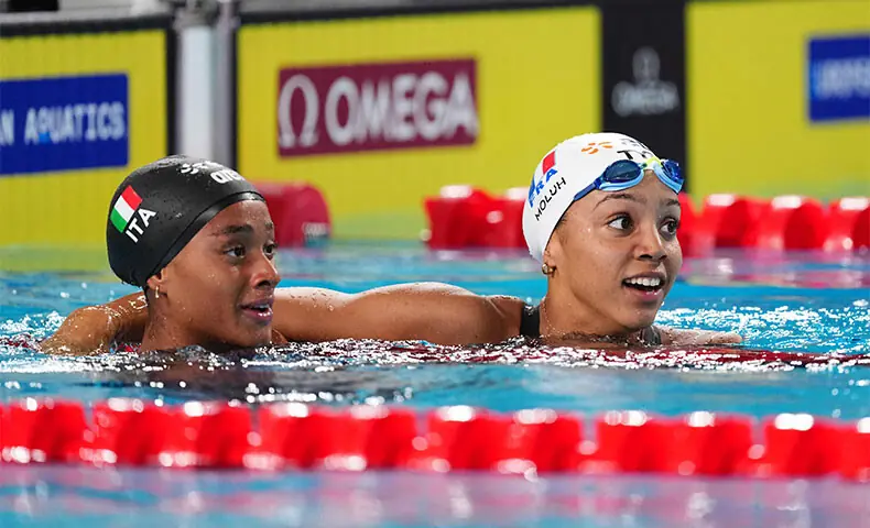 SAINT-DENIS: Italy’s Sara Curtis (L) and second-placed Mary-Ambre Moluh of France react after the women’s 50m backstroke final of the European Aquatics Championships at the Olympic Aquatic Centre.—AFP SAINT-DENIS: Italy’s Sara Curtis (L) and second-placed Mary-Ambre Moluh of France react after the women’s 50m backstroke final of the European Aquatics Championships at the Olympic Aquatic Centre.—AFP
