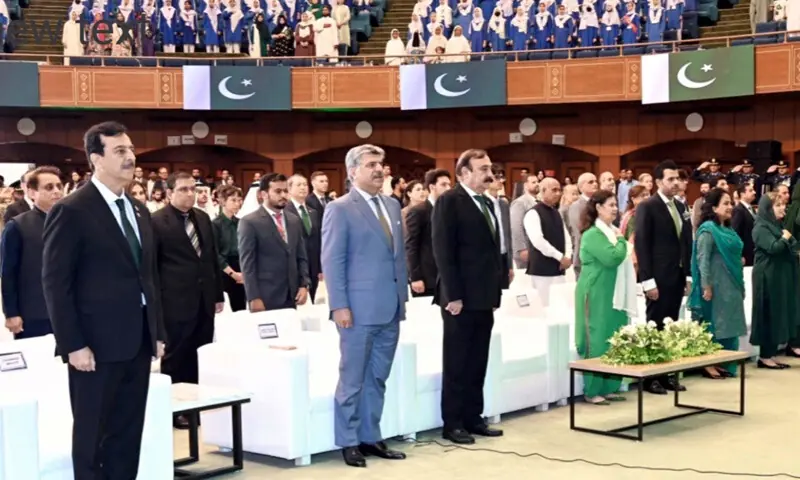 SENATE Chairman Yousaf Raza Gilani and others stand for the national anthem during the Azadi Cultural Show.—PPI SENATE Chairman Yousaf Raza Gilani and others stand for the national anthem during the Azadi Cultural Show.—PPI