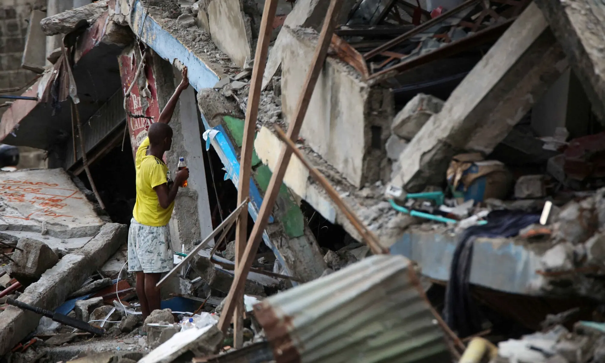 A man pauses amid debris in the aftermath of an earthquake in Quibdo, Colombia, August 14, 2026. — Reuters A man pauses amid debris in the aftermath of an earthquake in Quibdo, Colombia, August 14, 2026. — Reuters