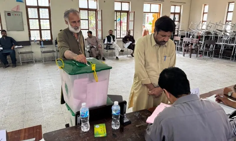 Citizens are pictured at a polling station in Muzaffarabad on August 2. — Photo by Tariq Naqash Citizens are pictured at a polling station in Muzaffarabad on August 2. — Photo by Tariq Naqash