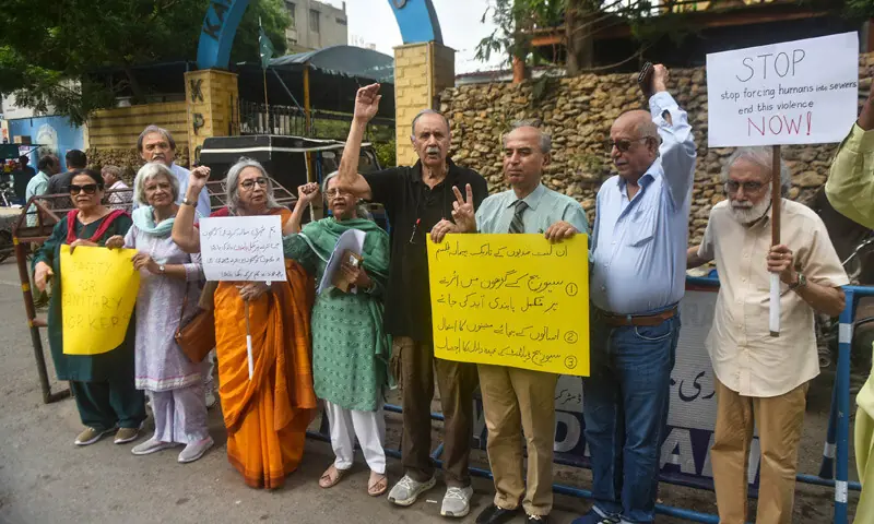 Activists stage a protest to demand a ban on manual cleaning of manholes, drains.—Fahim Siddiqi / White Star Activists stage a protest to demand a ban on manual cleaning of manholes, drains.—Fahim Siddiqi / White Star