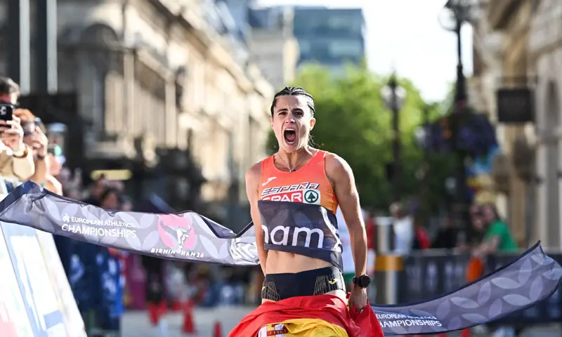 SPAIN’S Maria Perez celebrates as she crosses the finish line to win the women’s half marathon race walk during the European Athletics Championships at the Alexander Stadium on Saturday.—AFP SPAIN’S Maria Perez celebrates as she crosses the finish line to win the women’s half marathon race walk during the European Athletics Championships at the Alexander Stadium on Saturday.—AFP
