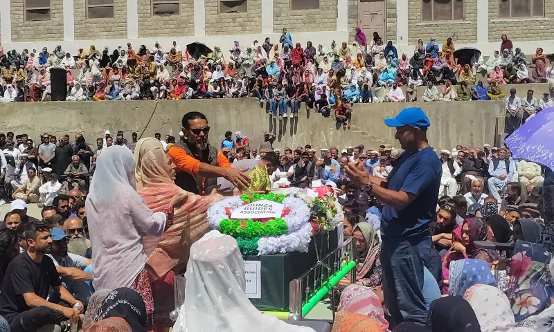 People from all over Gilgit-Baltistan gather to participate in the last rites of Sohail Sakhi, a Pakistani climber who perished in an avalanche on Broad Peak in July along with his entire expedition, at Aliabad College Ground in Hunza on August 16. — photo via author People from all over Gilgit-Baltistan gather to participate in the last rites of Sohail Sakhi, a Pakistani climber who perished in an avalanche on Broad Peak in July along with his entire expedition, at Aliabad College Ground in Hunza on August 16. — photo via author