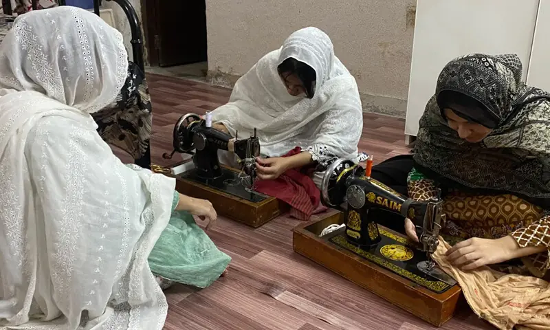 SANIA Hasnain imparts stitching skill to young girls in Peshawar. &mdash; Dawn