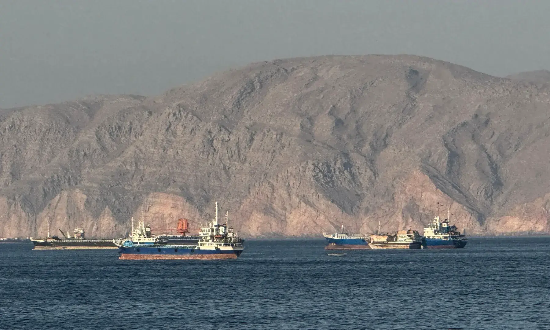 Vessels are seen anchored in the Strait of Hormuz, off the port city of Khasab on Oman&rsquo;s northern Musandam Peninsula on May 17, 2026. &mdash; AFP