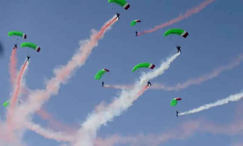 Indonesian military personnel perform skydiving during a ceremony marking the country's 81st Independence Day at the Presidential Palace in Jakarta, Indonesia, August 17, 2026. &mdash; Reuters