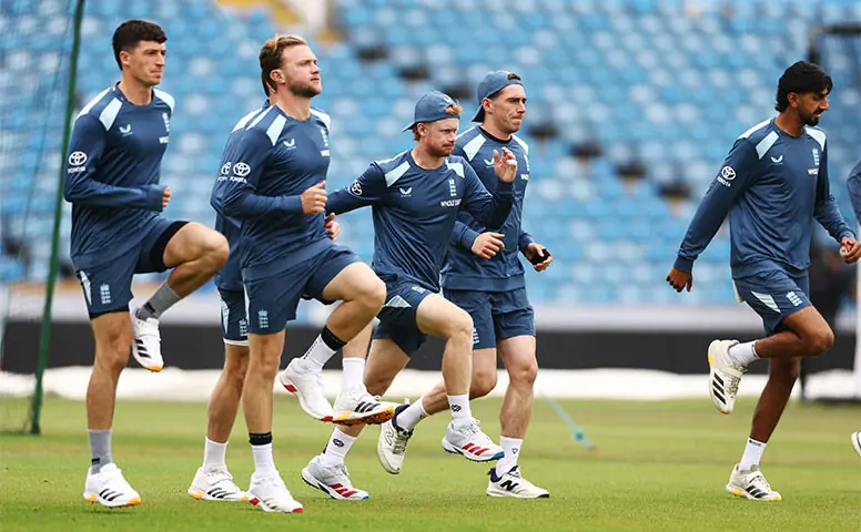 LEEDS: England cricketers warm up during a training session at Headingley on Monday.&mdash;Reuters