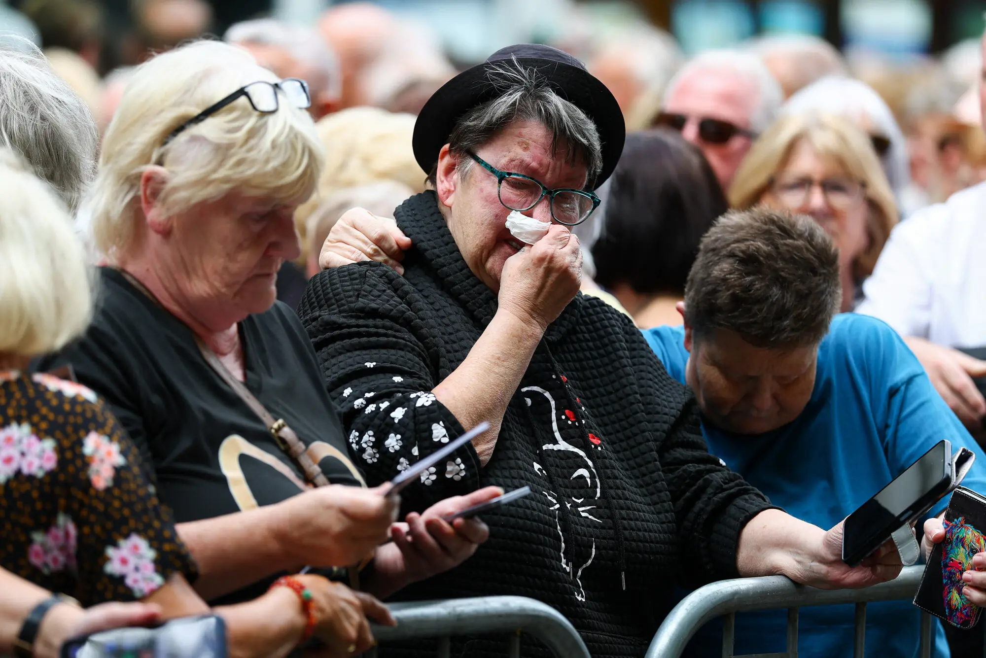 Fans outside the Swansea Minster on the day of Bonnie Tyler&rsquo;s memorial service. Photo: Reuters