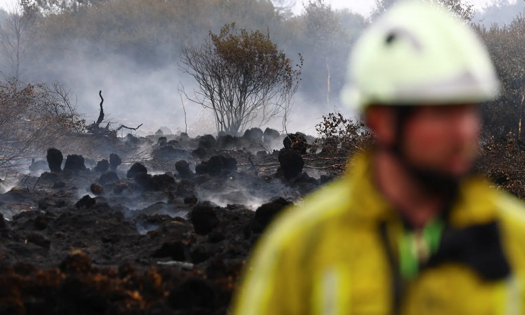 A Belgian firefighter in a field affected by a wildfire in Waimes, in the High Fens region, Belgium on August 18, 2026. —Reuters A Belgian firefighter in a field affected by a wildfire in Waimes, in the High Fens region, Belgium on August 18, 2026. —Reuters
