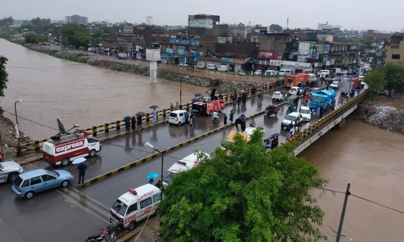 This image shows the water in Leh Nullah from Gawalmandi bridge on Wednesday. &mdash; Photo by Mohammad Asim