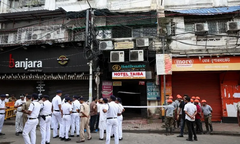 Firefighters and other officials stand on the street in the aftermath of a hotel fire that killed several people in Kolkata, India, August 19, 2026. — Reuters Firefighters and other officials stand on the street in the aftermath of a hotel fire that killed several people in Kolkata, India, August 19, 2026. — Reuters