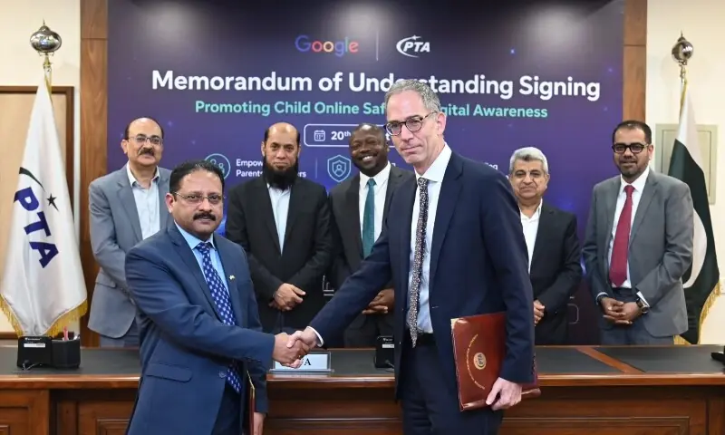 Officials from the Pakistan Telecommunication Authority and Google shake hands after signing a memorandum of understanding on August 20, 2026. &mdash; @PTAofficialpk/X