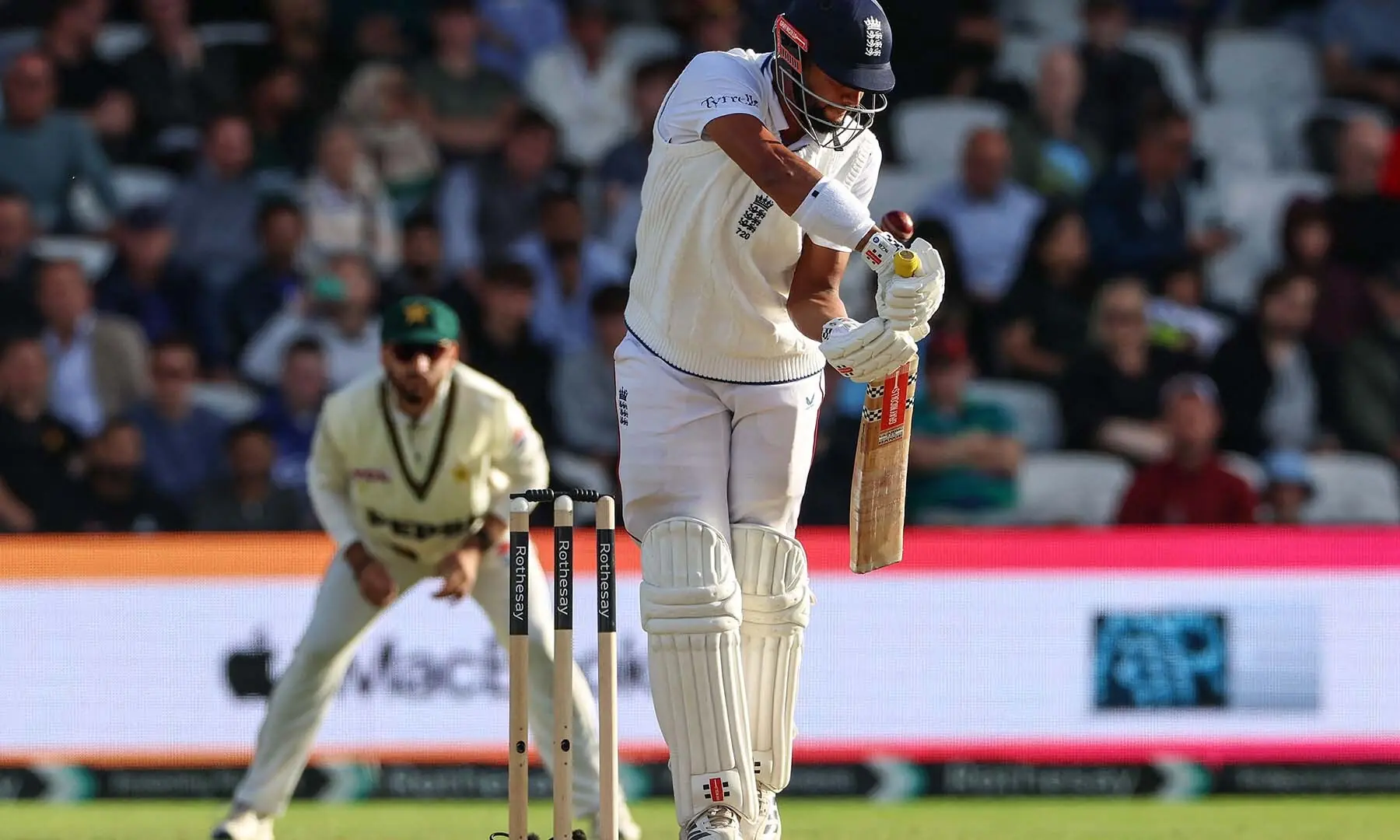 England’s Emilio Gay (R) edges the ball to be caught out on the opening day of the first Test match between England and Pakistan at Headingley cricket ground in Leeds, northern England on August 19, 2026. — AFP