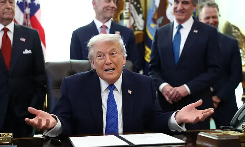 US President Donald Trump gestures as he speaks in the Oval Office, at the White House in Washington, DC, the US on January 30, 2026. &mdash; Reuters/File