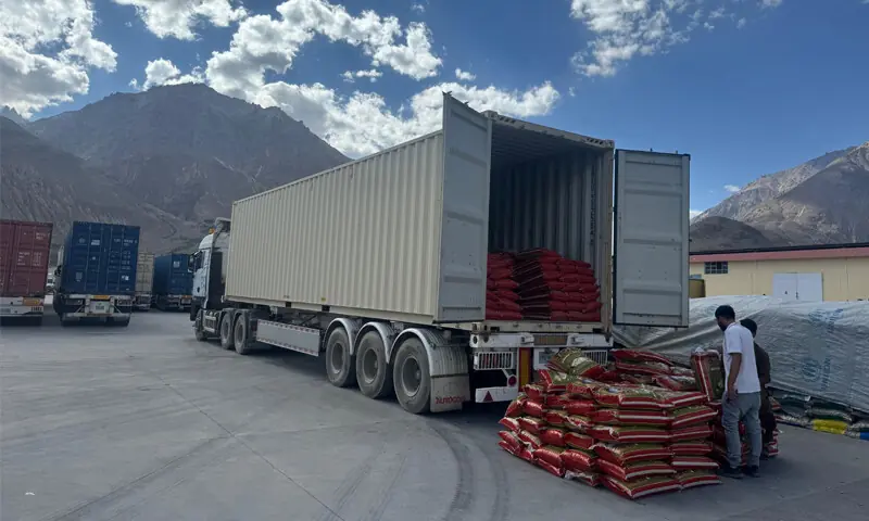 A shipment of Pakistani rice being checked at Sost Dry Port for export to Kyrgyzstan through China under the TIR system.—Dawn A shipment of Pakistani rice being checked at Sost Dry Port for export to Kyrgyzstan through China under the TIR system.—Dawn