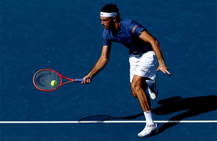 CINCINNATI: Taylor Fritz of the US plays a return against compatriot Brandon Nakashima during their Cincinnati Open quarter-final at the Lindner Family Tennis Center.—AFP CINCINNATI: Taylor Fritz of the US plays a return against compatriot Brandon Nakashima during their Cincinnati Open quarter-final at the Lindner Family Tennis Center.—AFP