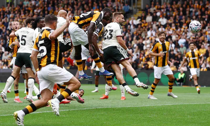 HULL: Nobel Mendy (fourth R) of Hull City heads to score during the Premier League match against Manchester United at the MKM Stadium on Saturday.—Reuters HULL: Nobel Mendy (fourth R) of Hull City heads to score during the Premier League match against Manchester United at the MKM Stadium on Saturday.—Reuters
