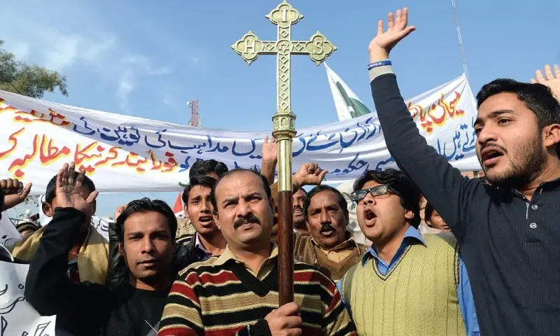 Members of the Christian community protest in front of the Peshawar Press Club in this undated image.— White Star/File Members of the Christian community protest in front of the Peshawar Press Club in this undated image.— White Star/File
