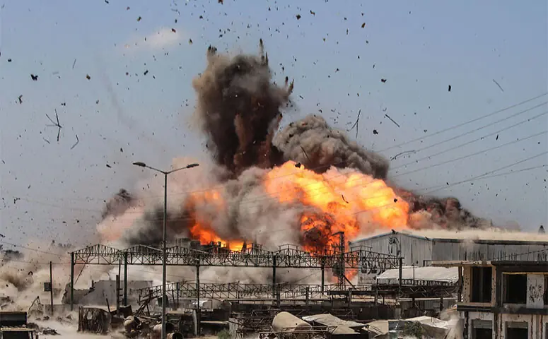 GAZA: A fireball rises after an Israeli strike in the al-Zawayda locality, which killed three people, including a four-year-old child.—AFP GAZA: A fireball rises after an Israeli strike in the al-Zawayda locality, which killed three people, including a four-year-old child.—AFP