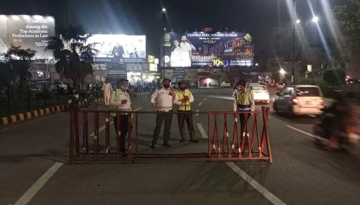 This representational image shows Lahore Traffic Police personnel standing on the road. &mdash; Facebook@citytraffic.policelhr/File