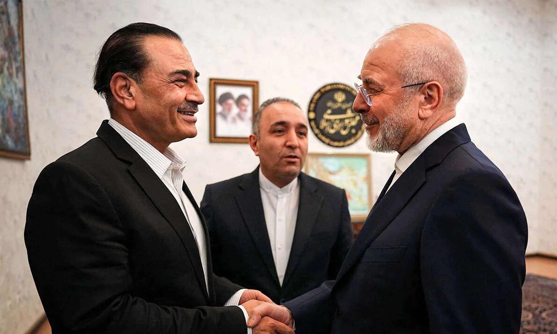 This handout picture provided by the Iranian parliament speaker&rsquo;s office shows speaker Mohammad Bagher Ghalibaf (R) receiving Chief of Defence Forces and Chief of Army Staff Field Marshal Asim Munir (L) in Tehran, Iran on August 24, 2026. &mdash; AFP