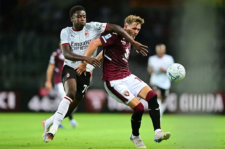 TURIN: Torino&rsquo;s Marcus Holmgren Pedersen (R) in action with AC Milan&rsquo;s Alphadjo Cisse during their Serie A match at Stadio Olimpico Grande Torino.&mdash;Reuters
