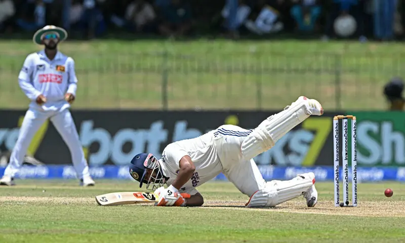 Indian batter Rishabh Pant loses his balance while playing a shot during the second Test against Sri Lanka at the Sinhalese Sports Club Ground on Monday.—AFP Indian batter Rishabh Pant loses his balance while playing a shot during the second Test against Sri Lanka at the Sinhalese Sports Club Ground on Monday.—AFP