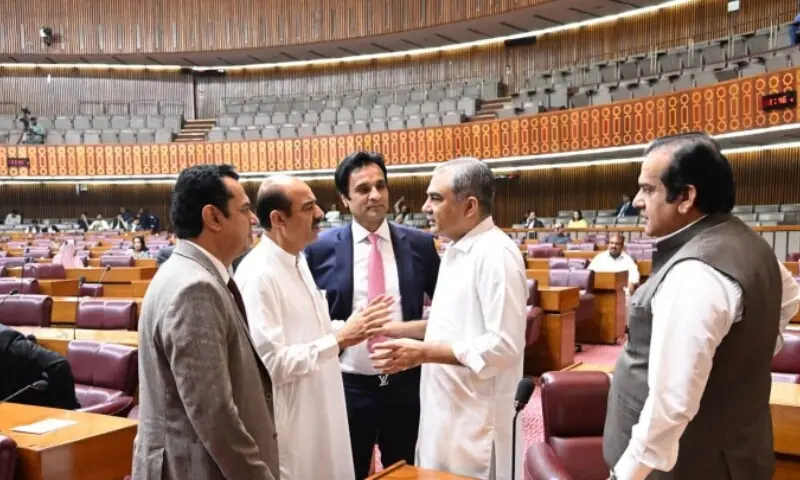 Interior Minister Mohsin Naqvi (centre) greets fellow lawmakers during a National Assembly session on Tuesday. &mdash;Photo courtesy NA/Facebook