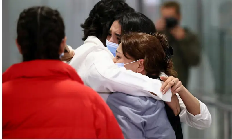 Elham, 29, embraces his mother and sister as he welcomes them at Hannover Airport as a group of Afghan nationals arrive in Germany from Pakistan, after legal and diplomatic pressure pushed Germany to resume a scheme that allows the entry of vulnerable Afghans, in Hannover, Germany, September 1, 2025. — Reuters/File Elham, 29, embraces his mother and sister as he welcomes them at Hannover Airport as a group of Afghan nationals arrive in Germany from Pakistan, after legal and diplomatic pressure pushed Germany to resume a scheme that allows the entry of vulnerable Afghans, in Hannover, Germany, September 1, 2025. — Reuters/File
