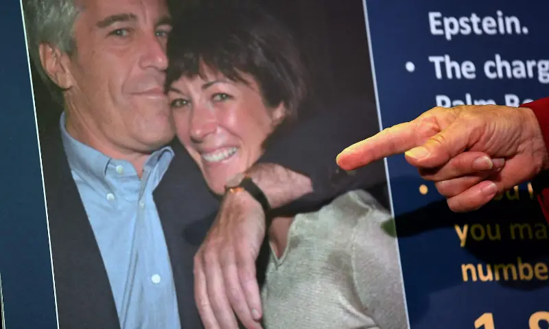 This July 2, 2020, file photo shows Acting US Attorney for the Southern District of New York, Audrey Strauss, pointing to a photo of Jeffrey Epstein and Ghislaine Maxwell while announcing charges against Maxwel during a press conference in New York City. — AFP/File This July 2, 2020, file photo shows Acting US Attorney for the Southern District of New York, Audrey Strauss, pointing to a photo of Jeffrey Epstein and Ghislaine Maxwell while announcing charges against Maxwel during a press conference in New York City. — AFP/File