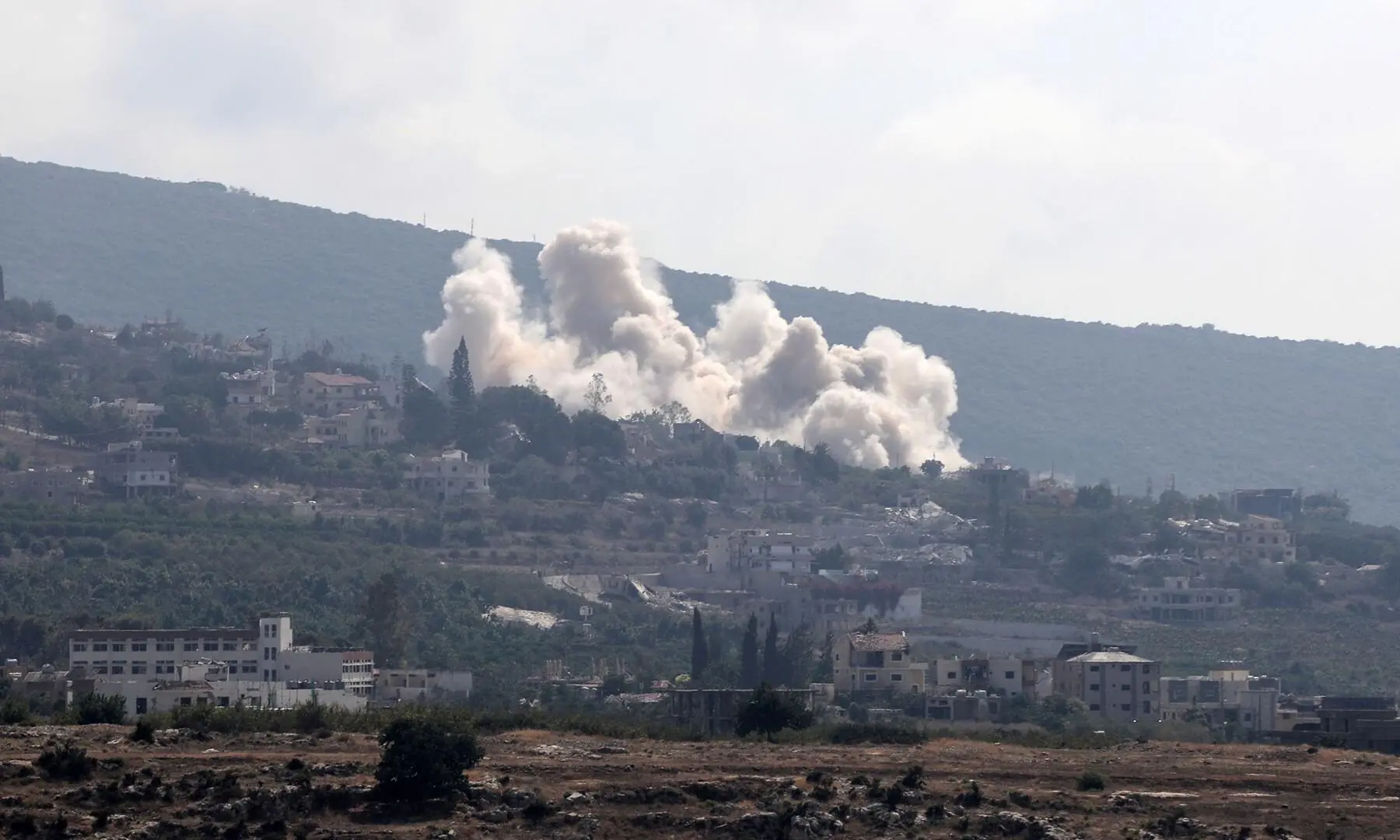This photo taken from the southern Lebanese city of Tyre shows smoke rising following an Israeli strike that targeted the village of Biout es Sayed on August 26, 2026. &mdash; AFP