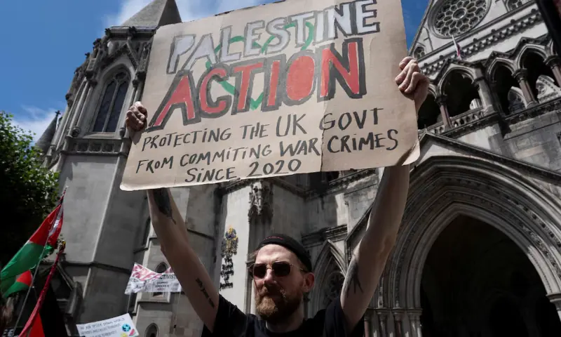 A supporter of pro-Palestinian organisation Palestine Action holds a banner outside London's High Court in London, Britain, on July 4, 2025. — Reuters/File A supporter of pro-Palestinian organisation Palestine Action holds a banner outside London's High Court in London, Britain, on July 4, 2025. — Reuters/File