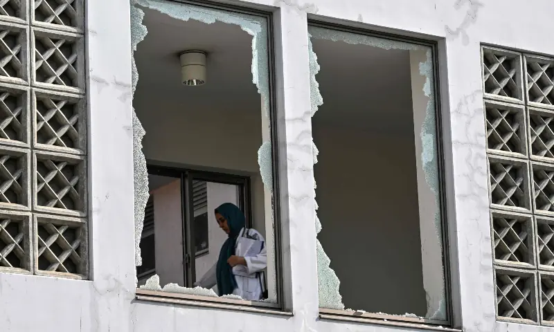 A medical staff member walks past a damaged corridor at the site, a day after a fire at the Mother and Child Health ward of the Pakistan Institute of Medical Sciences (Pims) Hospital in Islamabad on August 27, 2026. — AFP A medical staff member walks past a damaged corridor at the site, a day after a fire at the Mother and Child Health ward of the Pakistan Institute of Medical Sciences (Pims) Hospital in Islamabad on August 27, 2026. — AFP