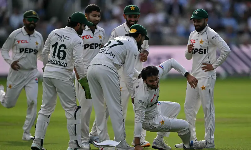 Salman Ali Agha (2R) is mobbed by teammates after catching the ball to take the wicket of England's Jordan Cox (unseen) for 55 runs on day one of the second test match between England and Pakistan at Lord's cricket ground in London on August 27, 2026. — AFP Salman Ali Agha (2R) is mobbed by teammates after catching the ball to take the wicket of England's Jordan Cox (unseen) for 55 runs on day one of the second test match between England and Pakistan at Lord's cricket ground in London on August 27, 2026. — AFP