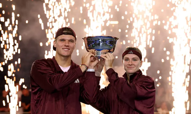 CZECH Republic&rsquo;s Karolina Muchova (R) and Jakub Mensik pose with the trophy after defeating Switzerland&rsquo;s Belinda Bencic and Flavio Cobolli of Italy in the US Open mixed doubles final at the Flushing Meadows.&mdash;Reuters