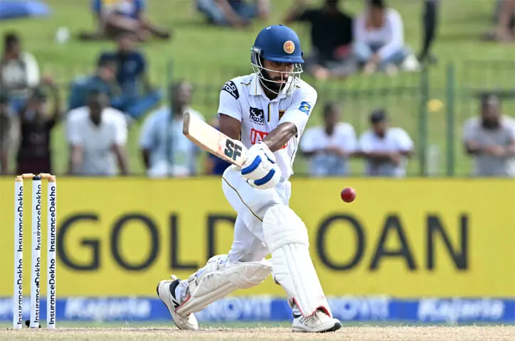 SRI LANKAN batter Sonal Dinusha plays a shot against India during the second Test at the Sinhalese Sports Club Ground on Thursday.—AFP SRI LANKAN batter Sonal Dinusha plays a shot against India during the second Test at the Sinhalese Sports Club Ground on Thursday.—AFP