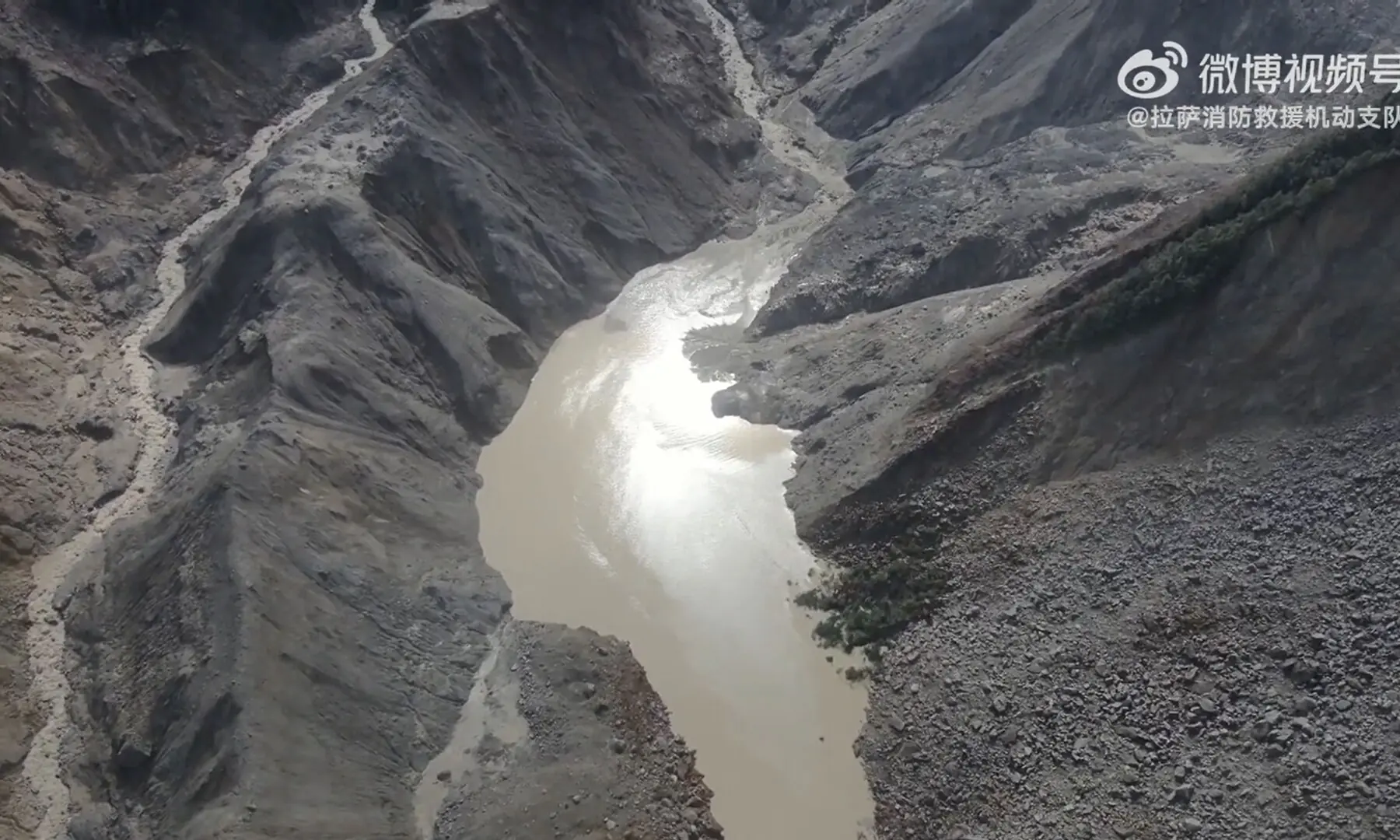 This aerial image released on the Lhasa Mobile Fire and Rescue Servic&rsquo;s account on Chinese social media platform Weibo on August 27, 2026, shows a barrier lake which formed after a landslide near where Nepal&rsquo;s Chhochen Khola River flows into the Purepu Tsangpo River, in Gyirong county, in China&rsquo;s Tibet region. &mdash; AFP
