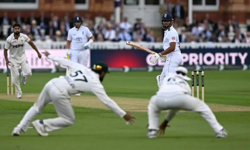 England's Emilio Gay looks on as Pakistan's Abdullah Shafique and Salman Ali Agha fail to catch the ball on day two of the second Test match between England and Pakistan at Lord's Cricket Ground in Leeds, London on August 28, 2026. &mdash; AFP